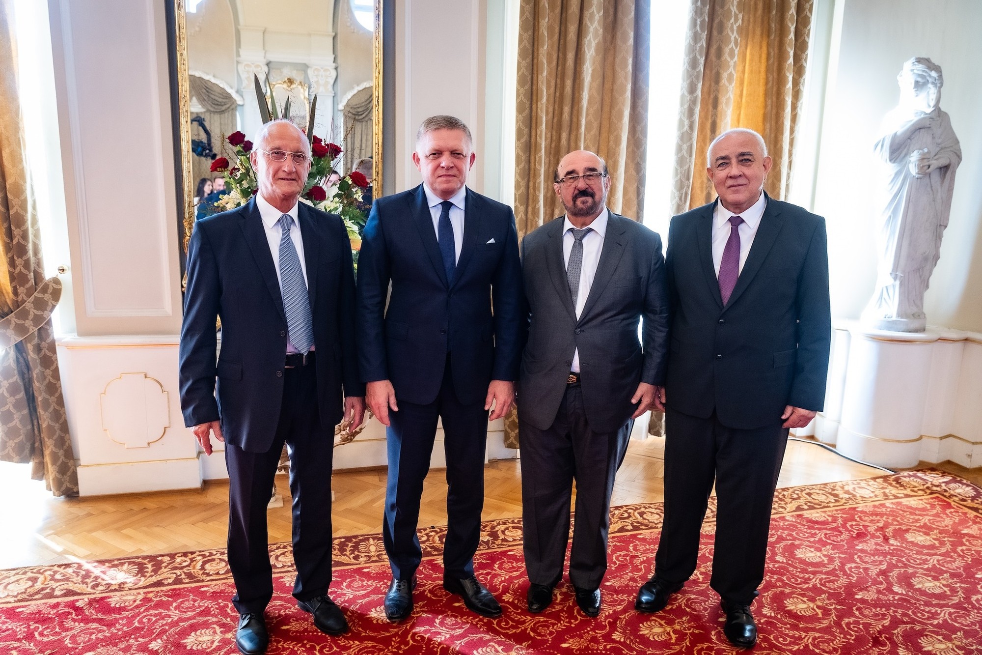 Zľava Jozef Banáš, premiér Robert Fico, Jan Telensky a Štefan Grman pri príležitosti Dňa Ústavy SR.