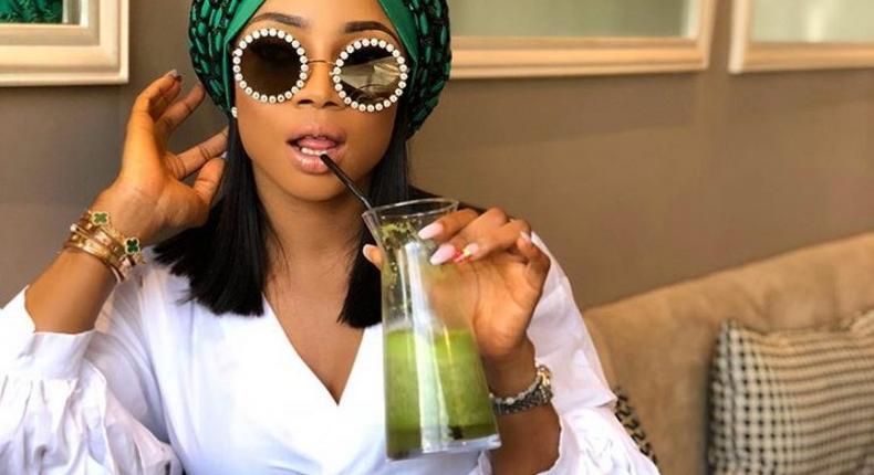 Toke Makinwa wears a stylish green turban from Turban Tempest