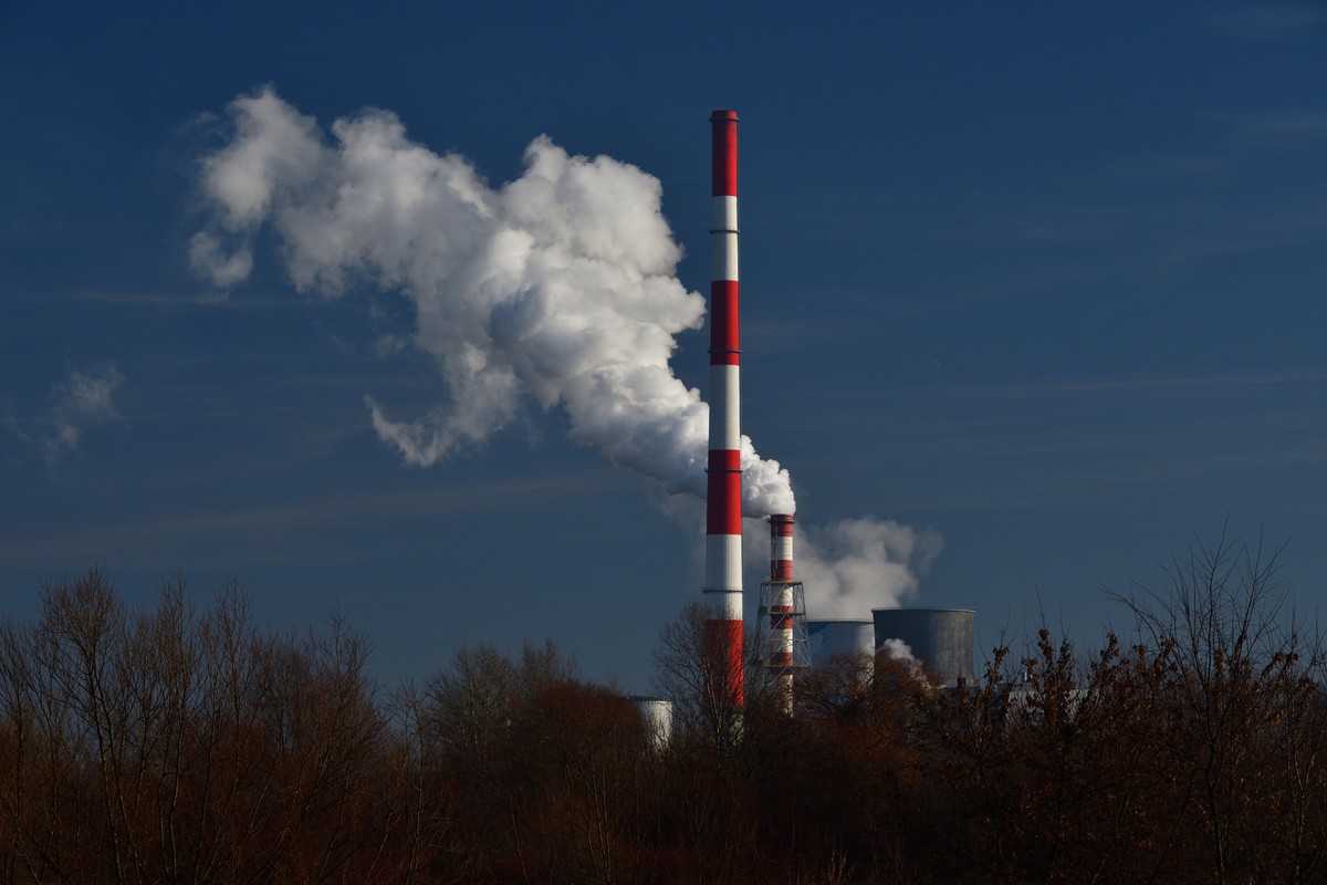 A,Coal-fired,Power,Plant,With,A,Smoking,Chimney,And,A