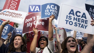 Supporters of the Affordable Care Act celebrate after the Supreme Court up held the law in the 6-3 v