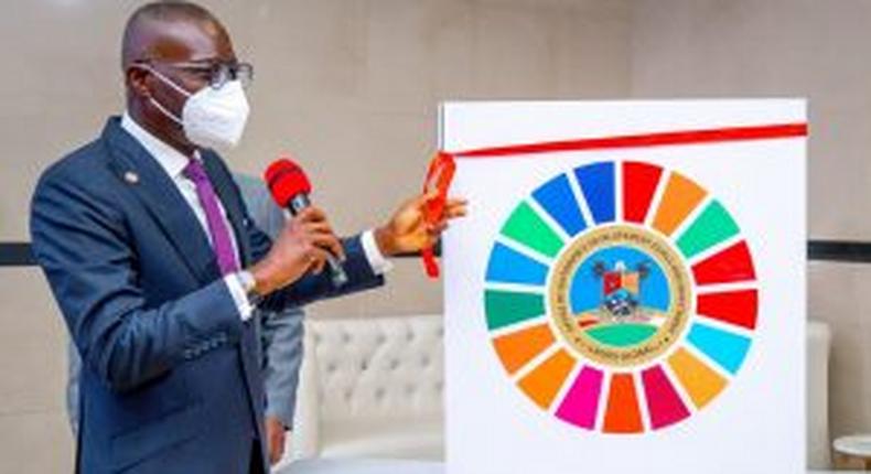 Lagos State Governor, Mr Babajide Sanwo-Olu, unveils the Lagos Deal Book during the third Lagos SDGs Investors Roundtable at the Civic Centre, Victoria Island, on Thursday.