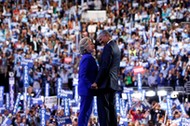 Clinton joins Obama onstage after his remarks on the third night of the Democratic National Conventi