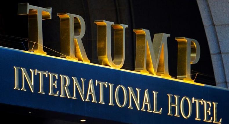 A man armed with a semi-automatic rifle is arrested at the Trump International Hotel