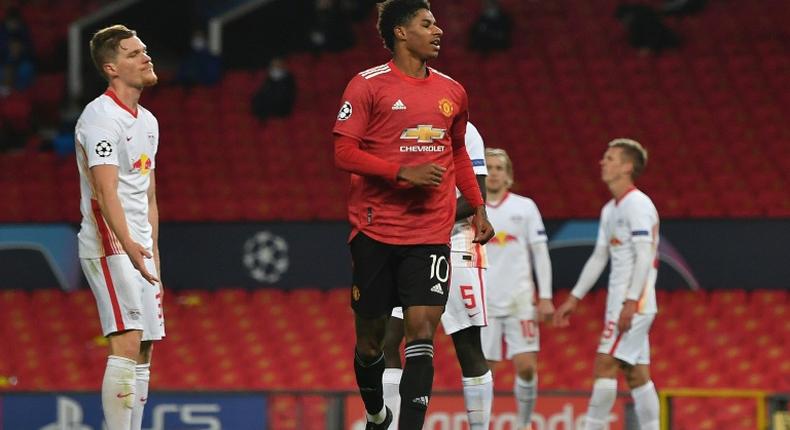 Marcus Rashford celebrates scoring his third goal and Manchester United's fifth in their big win over RB Leipzig