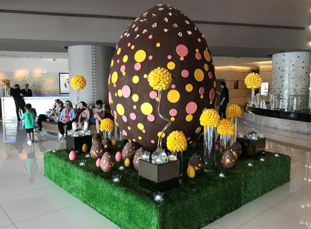 Easter egg weighing 80 kilos, that is partially made of dark chocolate is displayed at hotel in Duba