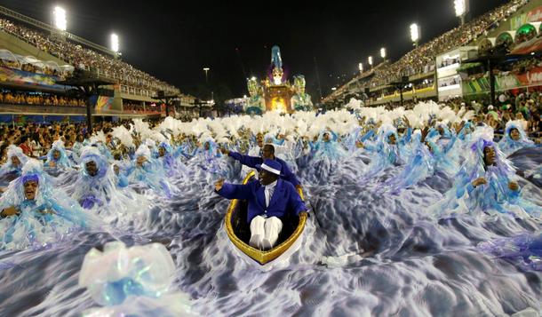 Revellers from Portela samba school perform during the second night of the carnival parade at the Sa