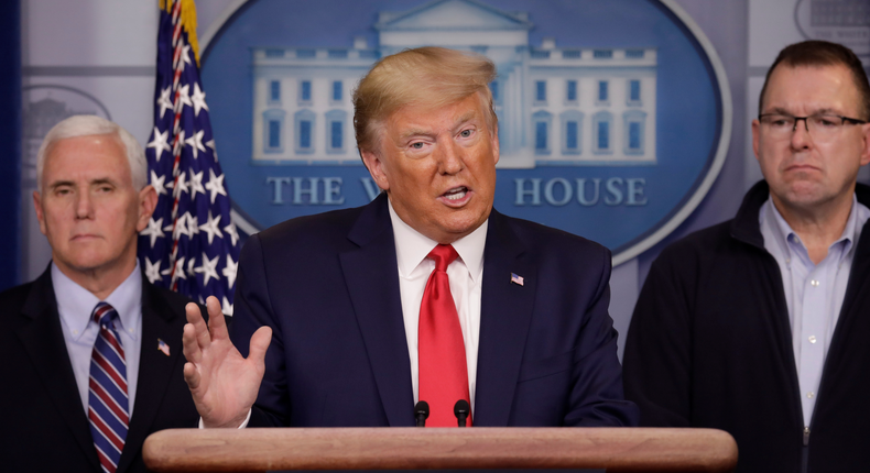 U.S. President Donald Trump, flanked by U.S. Vice President Mike Pence and FEMA Administrator Pete Gaynor, speaks during a news conference, amid the coronavirus disease (COVID-19) outbreak, in Washington D.C., U.S., March 22, 202