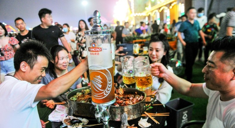 Beer-lovers were reassured by China's low numbers of new virus cases, and turned out to raise a glass