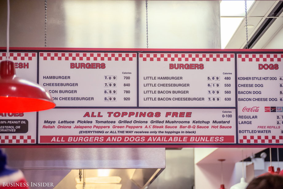 The menu is sans frills and flourishes. You can order burgers with choice of toppings, hot dogs, fries, and soda. Some locations — not all, unfortunately — offer milkshakes. The prices are very similar to Smashburger's, with the largest burger option just under $9.