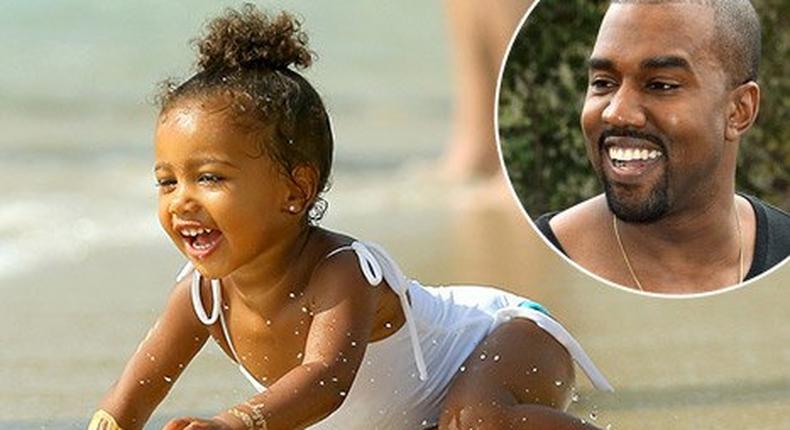 Starlet, North West, 2, playing at the beach while on vacation with her family in St Barts