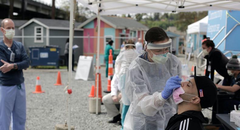 coronavirus test testing facility swab seattle low income housing