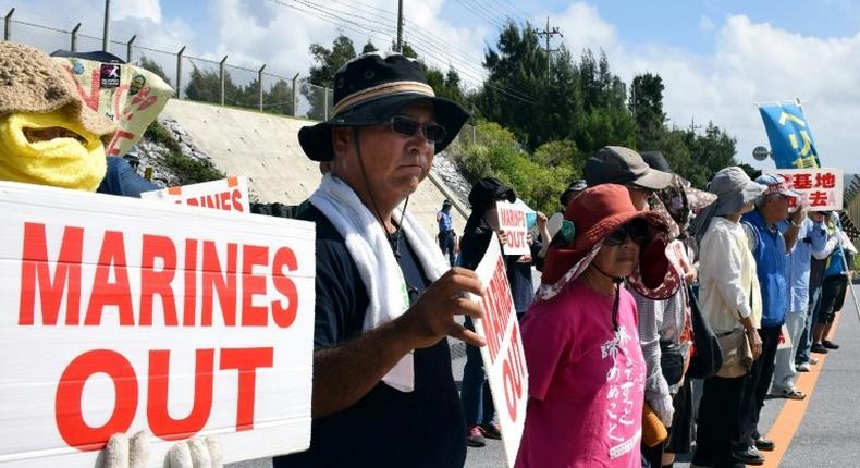 Protesters outside Camp Schwab in Nago, Okinawa prefecture, in September