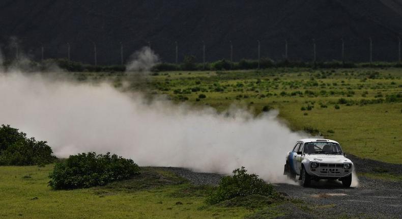 Kenya's racer Hardev Sira drives his classic Ford Escort across a flat plain on the second race of the third and last day of the Safari rally at Malewa bay in Kenya's lakeside town of Naivasha, on July 7, 2019. (Photo by TONY KARUMBA / AFP via Getty Images)
