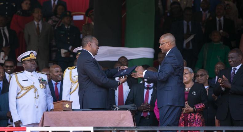 President Uhuru Kenyatta with CBK governor Patrick Njoroge