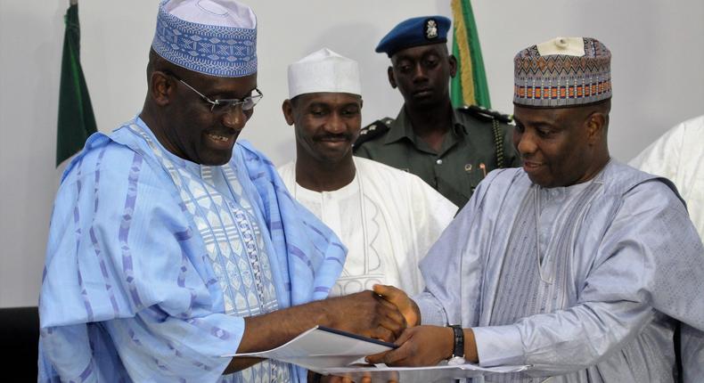 L-R: Ag Managing Director of Bank of Industry, Mr. Wahid Olagunju with Sokoto State Governor, Aminu Waziri Tambuwal, after the signing of agreement to provide N2billion to SMEs in Sokoto. Middle of Deputy Governor Ahmed Aliyu....Thursday 05/05/2016