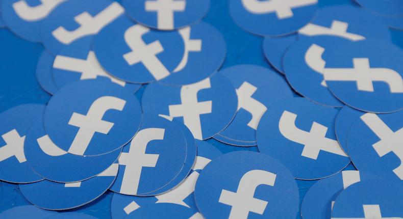 FILE PHOTO: Stickers bearing the Facebook logo are pictured at Facebook Inc's F8 developers conference in San Jose, California, U.S., April 30, 2019.  REUTERS/Stephen Lam/File Photo