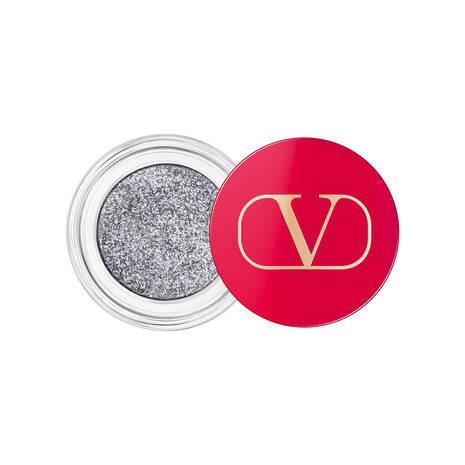 Les paillettes multi-reflets «Dreamdust» de Valentino Beauty, à 45 francs, assurent un regard glamour.
