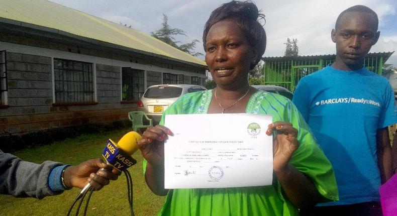 Elgeyo Marakwet woman representative hopeful Florence Boinett displays the certificate the received fromt he IEBC after clearance on May 31, 2017.