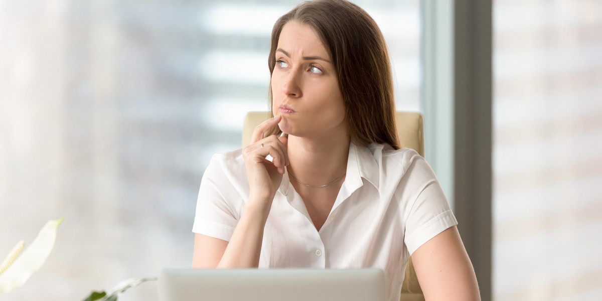 Businesswoman thinking about difficult question