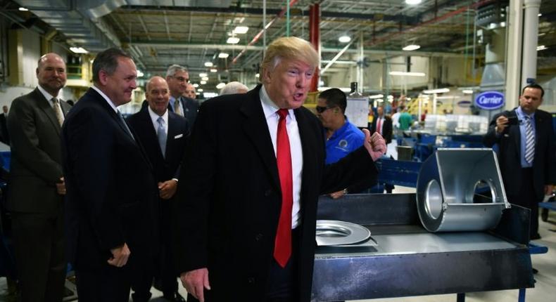 Donald Trump visited an Indiana factory that makes Carrier air conditioners, trumpeting a deal to keep 1,100 jobs from being shifted to Mexico