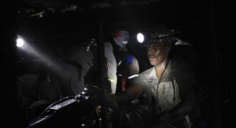 A miner is seen underground at Lonmin Plc's Karee mine in Marikana, Rustenburg 100 km (62 miles) northwest of Johannesburg, March 5, 2013. REUTERS/Siphiwe Sibeko