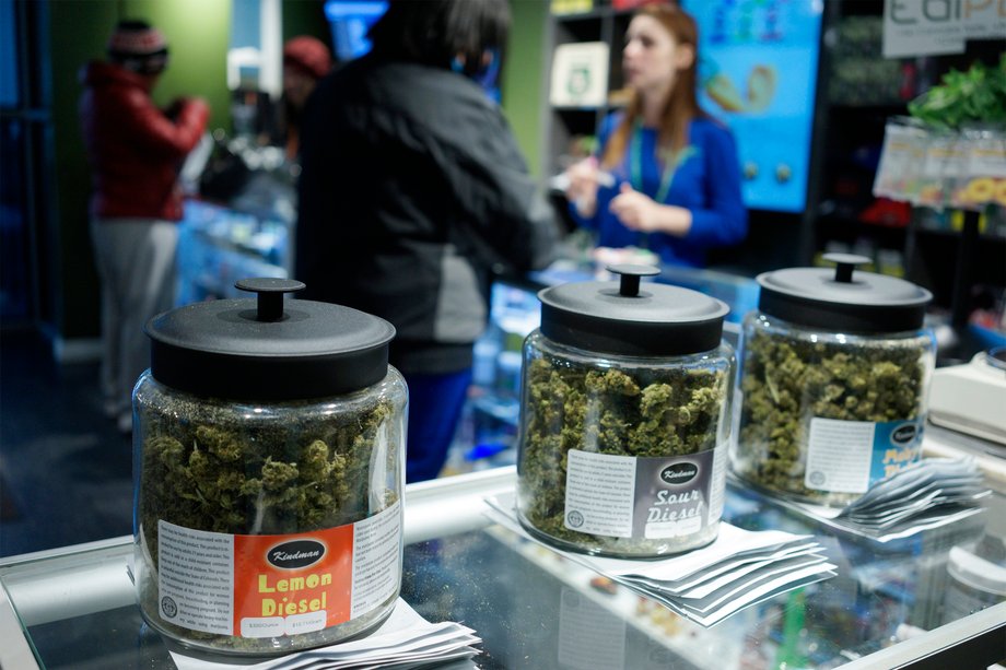 Customers shop for "Green Friday" deals at the Grass Station marijuana shop on Black Friday in Denver, Colorado, on November 28, 2014.