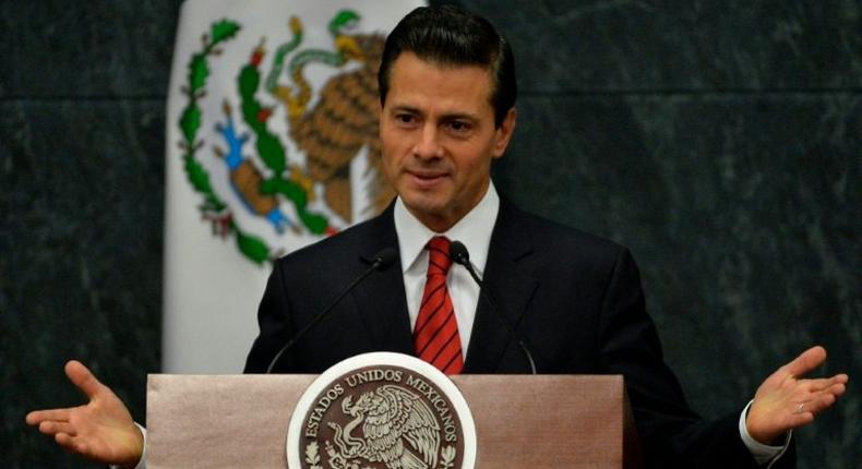 Mexico's President Enrique Pena Nieto gestures as he delivers a message to the media about US presidential candidate Donald Trump's triumph at Los Pinos presidential residence on November 9, 2016 in Mexico City