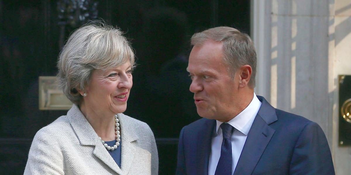 Britain's Prime Minister Theresa May (L) greets European Council President Donald Tusk in Downing Street in London, Britain September 8, 2016.