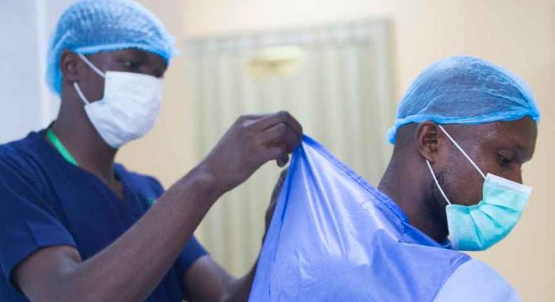 FG to source protective equipment for Coronavirus locally/Illustration. [Premium Times]