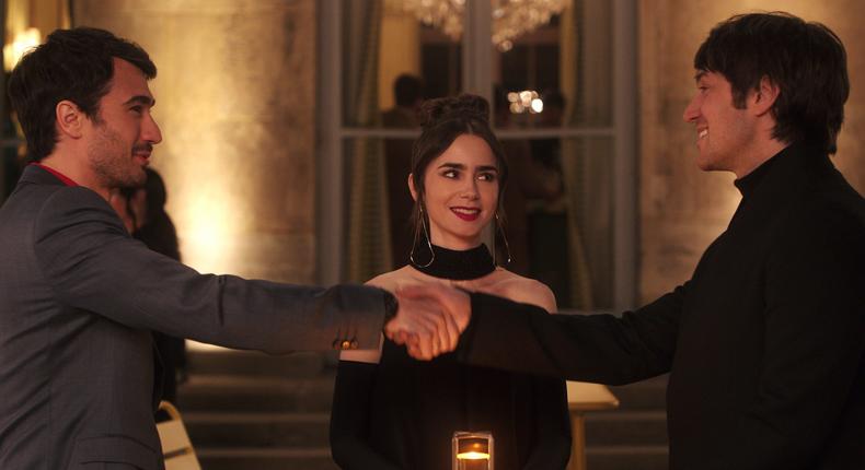 Eugenio Franceschini as Marcello, Lily Collins as Emily, and Lucas Bravo as Gabriel in season four of Emily in Paris.Netflix