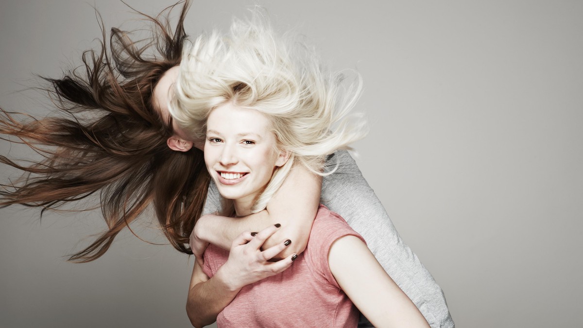 Studio portrait of two women who are best friends