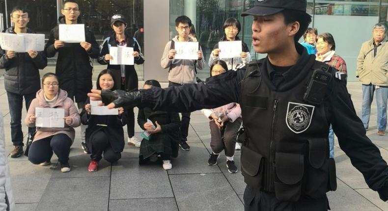 Any hint of campus activism in China sparks deep concern among authorities. This picture from November 8 shows demonstrating students outside an Apple Store in Bejing