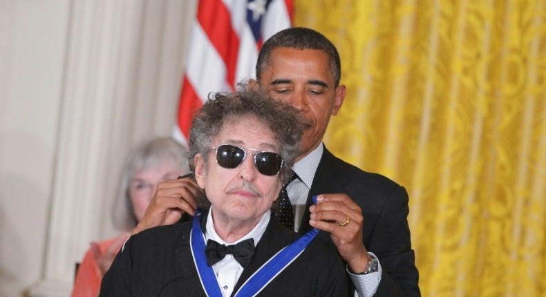 Bob Dylan, whose new album Triplicate comes out March 31, is shown here receiving the Presidential Medal of Freedom during a 2012 White House ceremony