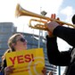 Demonstrators take part in a protest in front of the European Parliament as MEPs debate on modificat