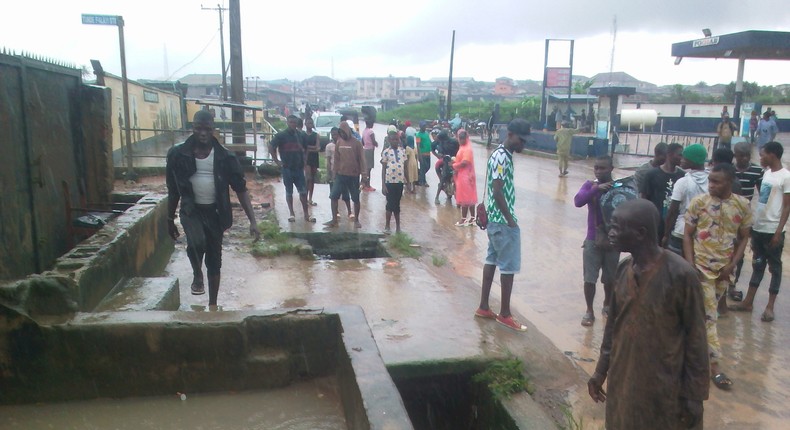 The drain beside the Aboru -Iyana-Ipaja canal along Ige Road that carried away the victims on Saturday (NAN)