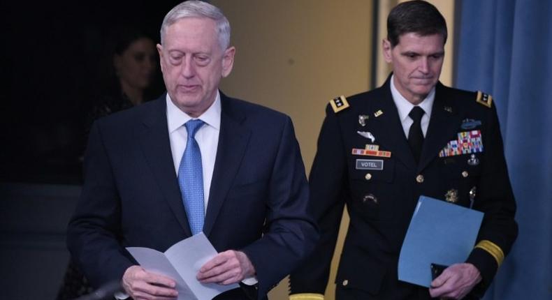 US Secretary of Defense James Mattis (L) and Central Command Commander Joseph Votel arrive for a briefing at the Pentagon in Washington, DC, on April 11, 2017