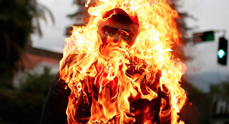 An effigy depicting Venezuelan President Nicolas Maduro during the traditional burning of Judas as part of Holy Week celebrations, at a street in Caracas, Venezuela.