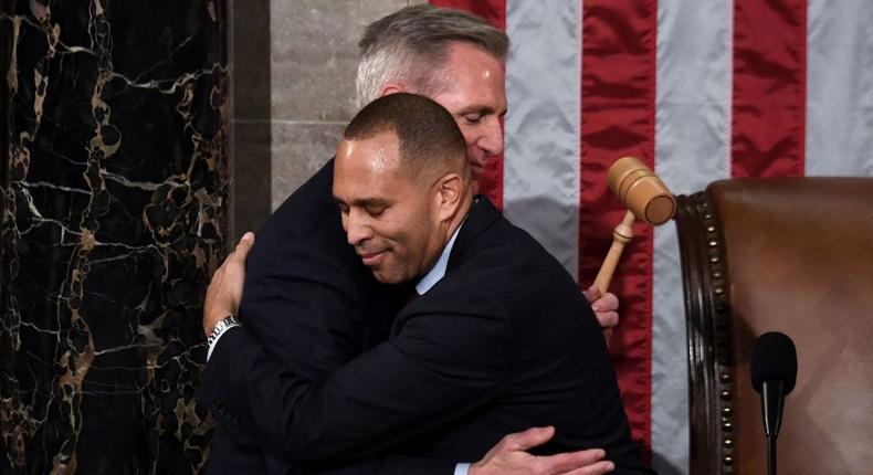 Minority Leader Hakeem Jeffries hugs newly elected Speaker of the US House of Representatives Kevin McCarthy after he was elected on the 15th ballot at the US Capitol in Washington, DC, on January 7, 2023.OLIVIER DOULIERY/AFP via Getty Images