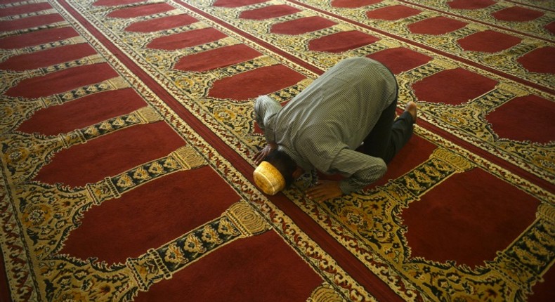 A man prays at the Dawatagaha Jumma Masjid mosque in Colombo. Sri Lankan Muslim groups say they warned authorities about the increased radicalisation of Easter Sunday attack ringleader Zahran Hashim