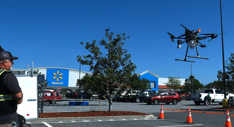 A flight engineer performing a functional test of a delivery drone at the Walmart Supercenter in Florida.Paul Hennesy/Anadolu Agency via Getty Images