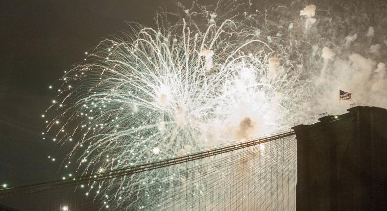 People watch the Macy's Fourth of July Fireworks from Brooklyn Bridge Park on July 4, 2016 in the Brooklyn borough of New York City. The celebrations mark the nation's 240th Independence Day.