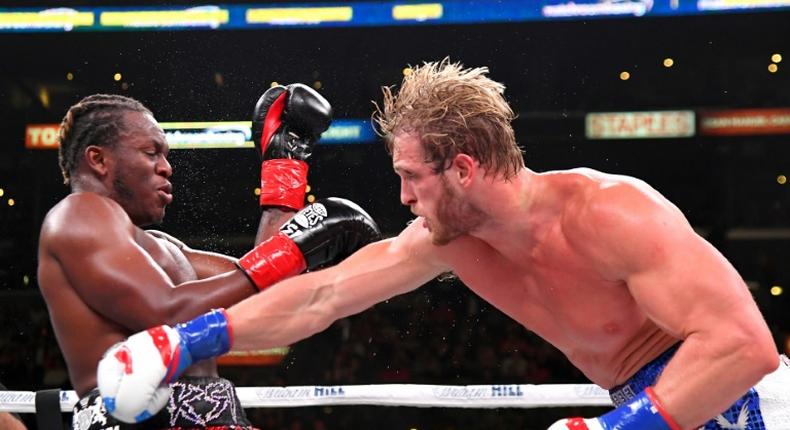 Logan Paul, right, delivers a punch to KSI in their cruiserweight fight Saturday at Los Angeles