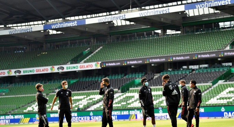 Bayern Munich players wear face masks before a Bundesliga match Creator: Martin MEISSNER