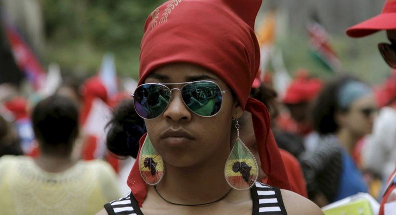 An Ethiopian migrant domestic worker attends a parade in Beirut, to support the rights of migrant domestic workers in Lebanon and calling for a domestic workers union in Beirut May 3, 2015. REUTERS/Alia Haj