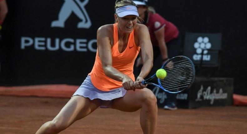 Russia's Maria Sharapova returns to Mirjana Lucic-Baroni of Croatia during their Rome ATP Tennis Open tournament on May 16, 2017 at the Foro Italico in Rome