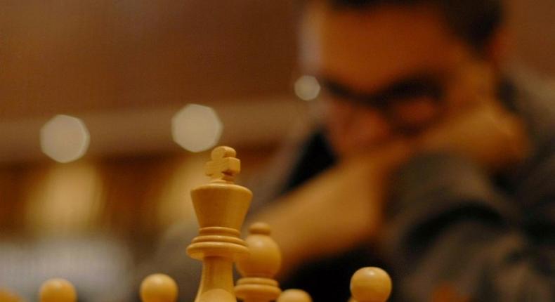 The Malaysian Chess Federation said it would investigate after the exclusion of the young player over her clothing prompted a public backlash