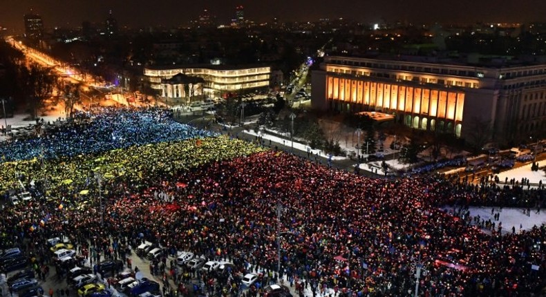 People protest in front of the government headquarters in Bucharest, against the controversial corruption decrees on February 12, 2017