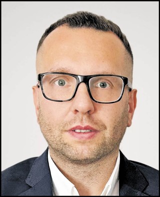 Grzegorz Grochowina, szef zespołu zarządzania wiedzą w departamencie podatkowym w KPMG w Polsce