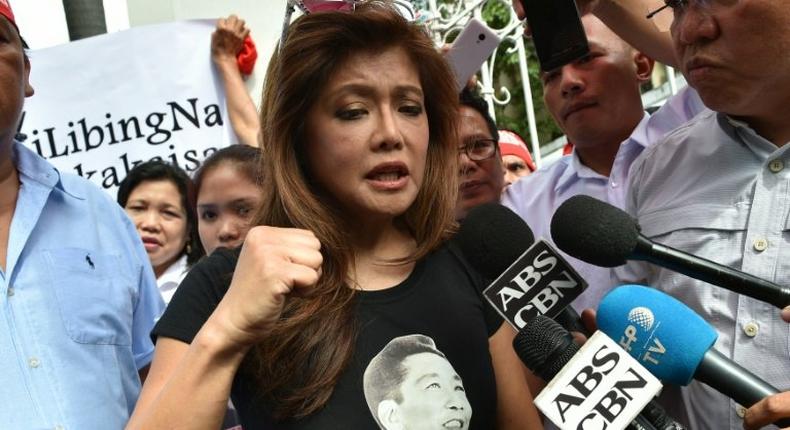 Imee Marcos, daughter of the late Philippines dictator Ferdinand Marcos and governor of the family's northern stronghold of Ilocos Norte, at a vigil in front of the Supreme Court in Manila on October 17, 2016