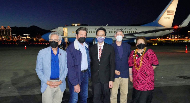 In this photo released by the Taiwan Ministry of Foreign Affairs, from left, US Democratic House member Alan Lowenthal from California, Democratic House members John Garamendi, Donald Yu-Tien Hsu, Director-General, dept. of North American Affairs, Taiwan's Ministry of Foreign Affairs, Democratic House member Don Beyer from Virginia and Republican Rep. Aumua Amata Coleman Radewagen, a delegate from American Samoa pose for a photo after arriving on a US government plane at Songshan airport in Taipei, Taiwan on Sunday, Aug 14, 2022.